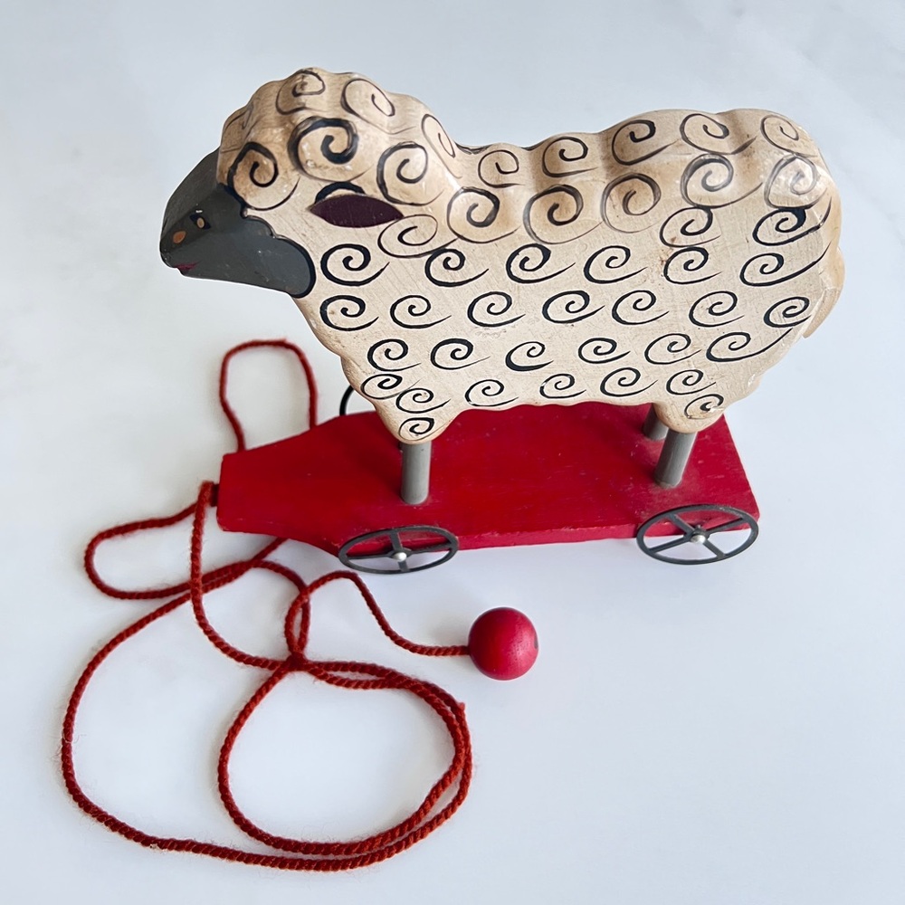 Vintage Primitive sheep Wooden Pull Along metal wheels 1970s